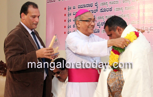 Ministers honoured at Bishop House